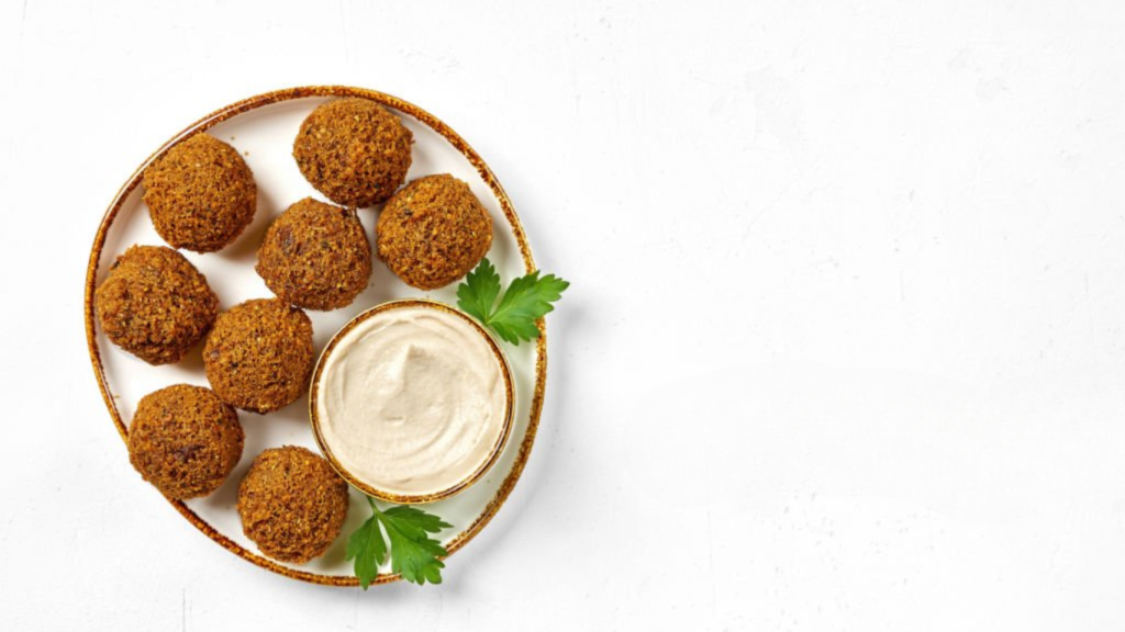 Plate of chickpeas falafel with tahini sauce