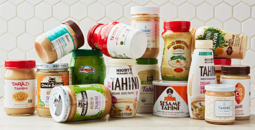 Jars of different tahini brands